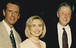 Holmes with the Clintons